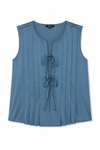 flat lay of a blue satin tie front sleeveless top on a white background 