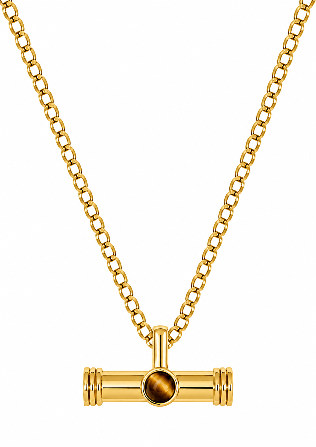 A gold-tone chain necklace with a horizontal bar pendant featuring a central round amber-brown bead, displayed on a clean white background.