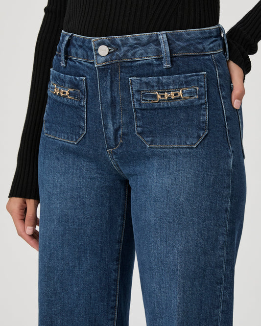 dark blue denim straight leg jeans with 2 front patch pockets with gold buckle detail close up