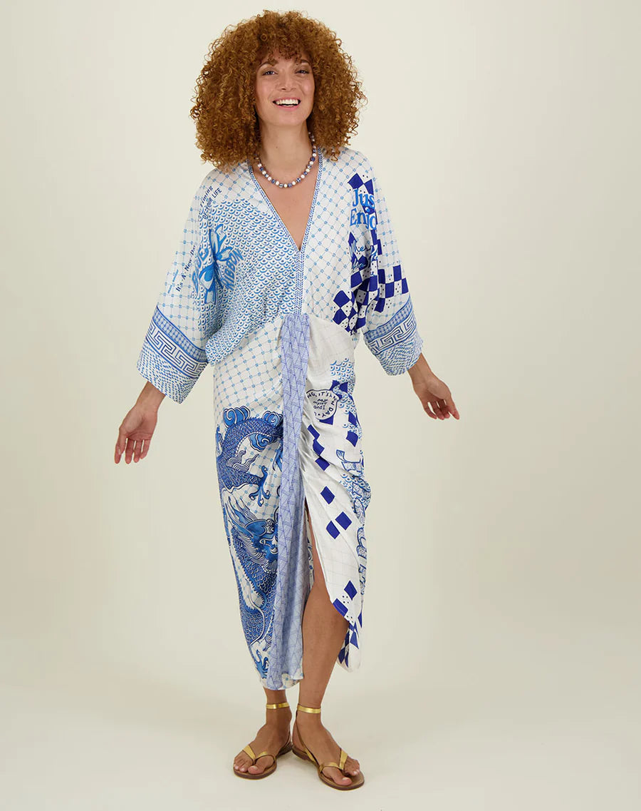 Kimono style ivory and blue dress with twist front and centre front split and V neckline with dragon and floral print and contrasting fabrics