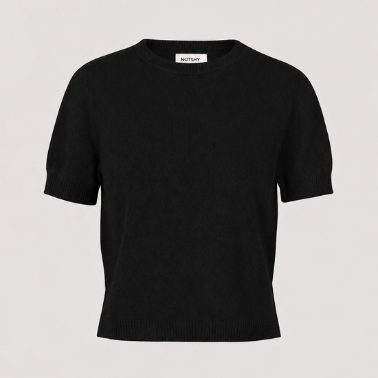 A black short-sleeve knit sweater with a crew neck, displayed flat against a light gray background. A small white brand label reading 'Maison Margiela' is visible inside the collar.