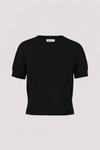 A black short-sleeve knit sweater with a crew neck, displayed flat against a light gray background. A small white brand label reading 'Maison Margiela' is visible inside the collar.