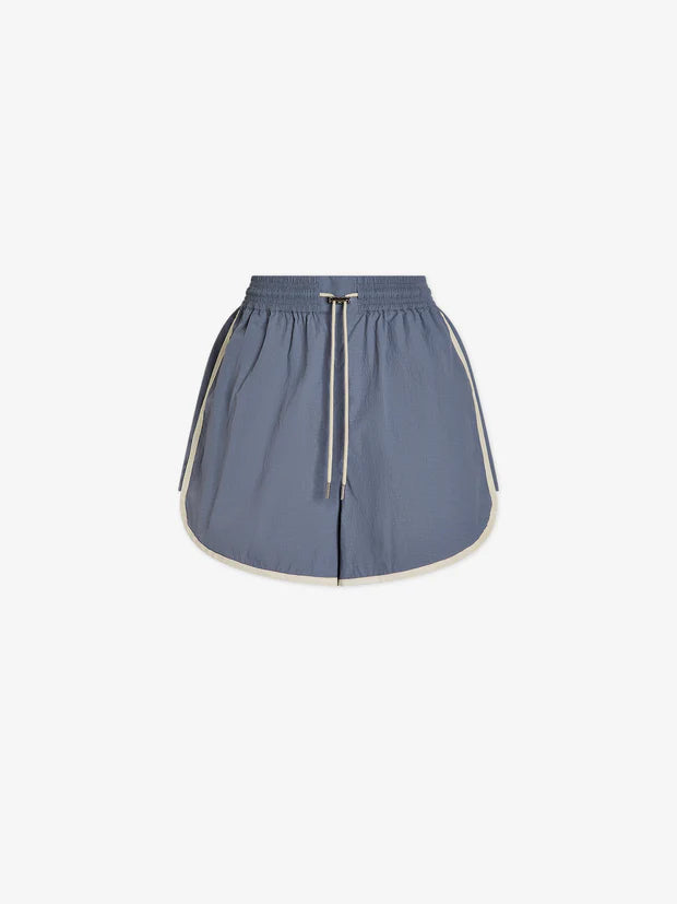 Light blue shorts with contrast piping and a drawstring waist
