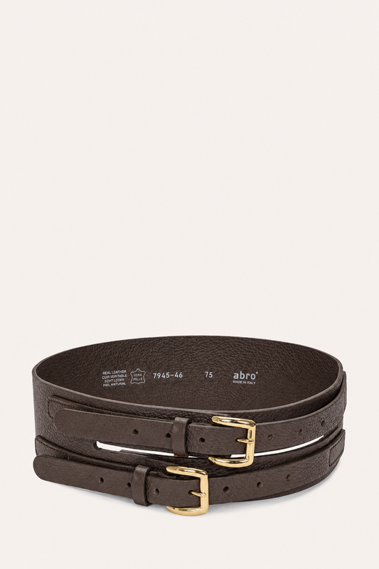Two dark brown textured leather belts with gold-tone buckles, stacked and photographed on a light cream background. The brand name 'abro' is visible on the inside of the belt strap.