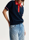 model wearing colouful polo top