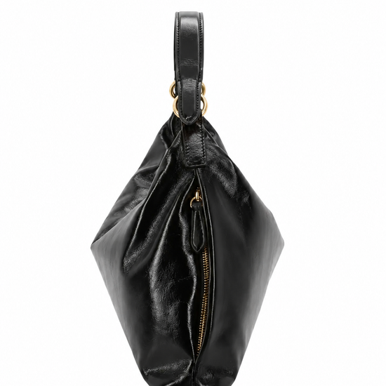 A black leather slouchy hobo handbag with gold-tone hardware and a single shoulder strap, photographed against a plain white background.