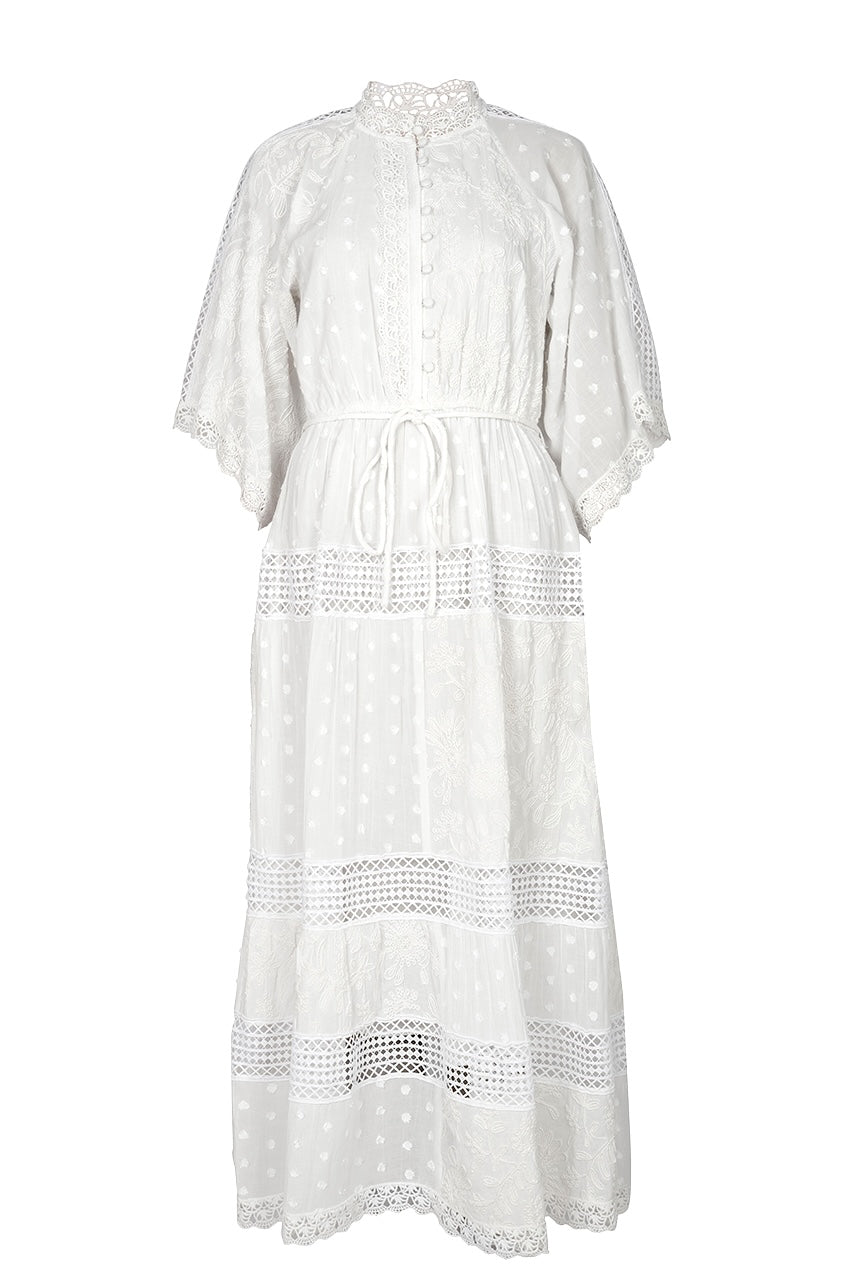 White dress with lace details on a white background