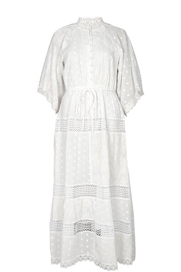 White dress with lace details on a white background