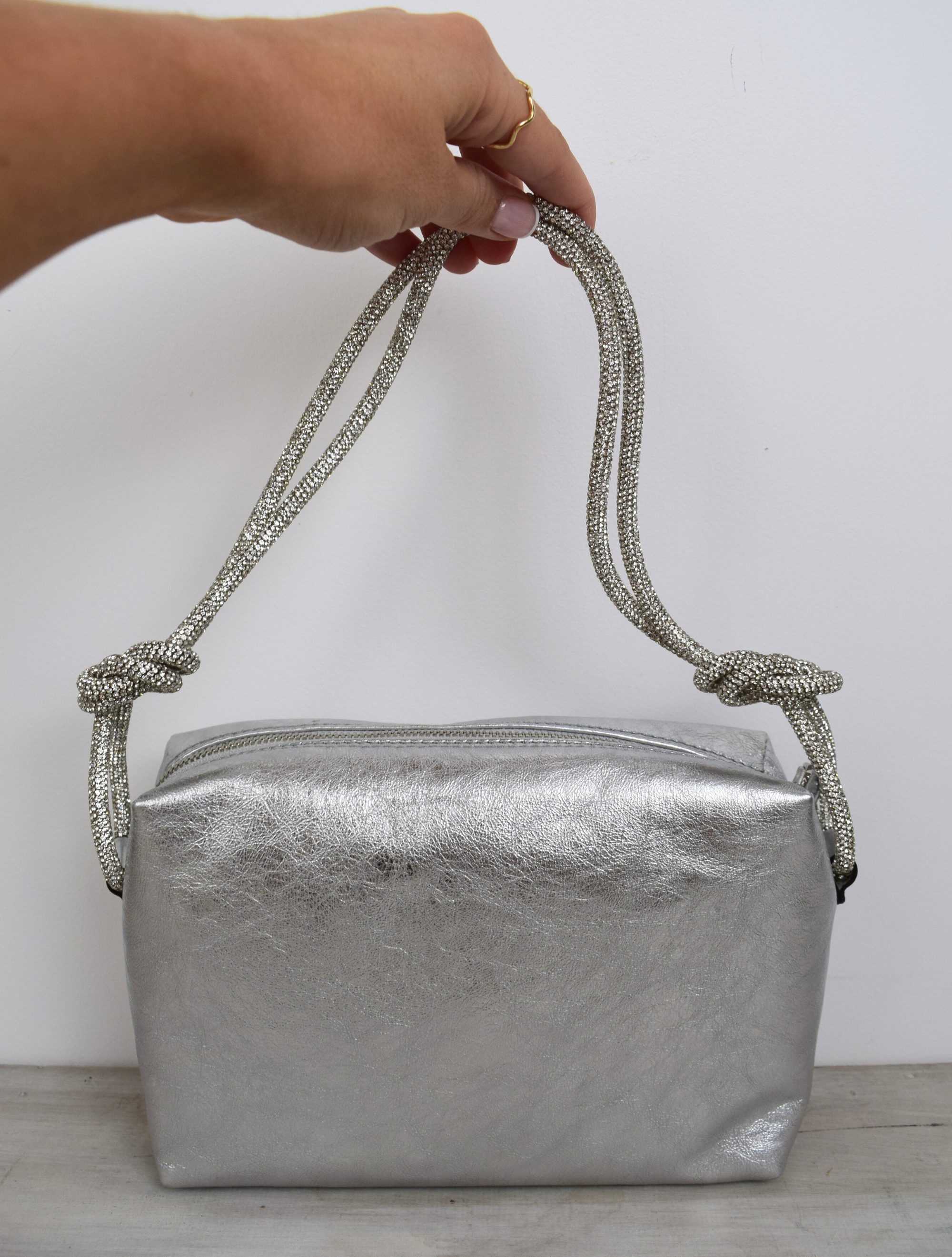 Silver leather bag with knotted sparkly shoulder strap