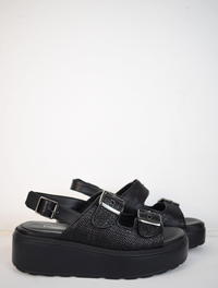 black raffia sandals with strap across back 