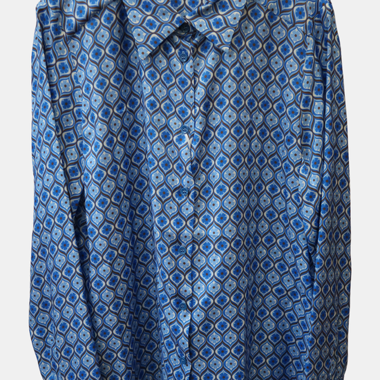 Blue patterned shirt on a hanger against a white background