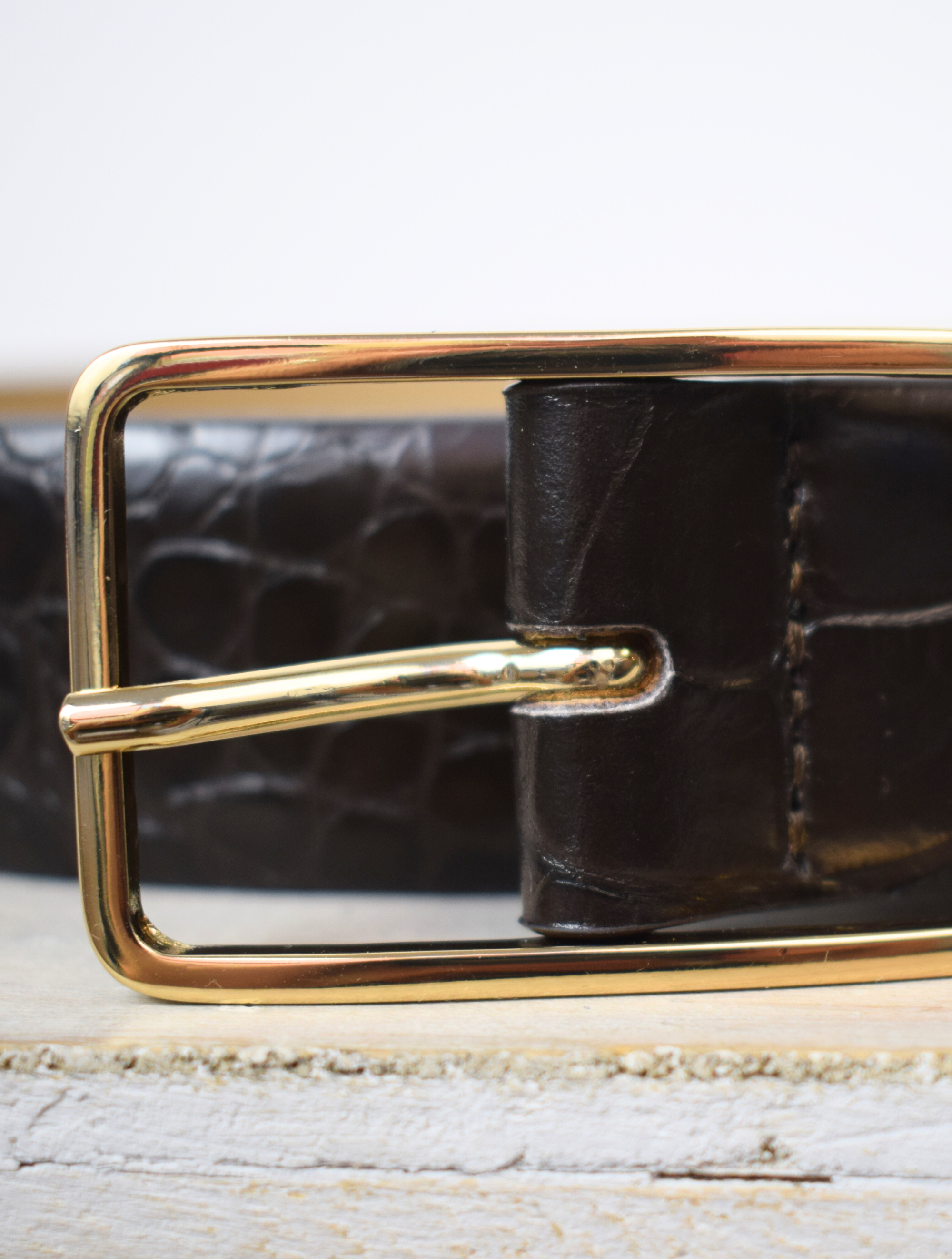 Medium mock croc dark brown leather belt with gold metallic oblong buckle