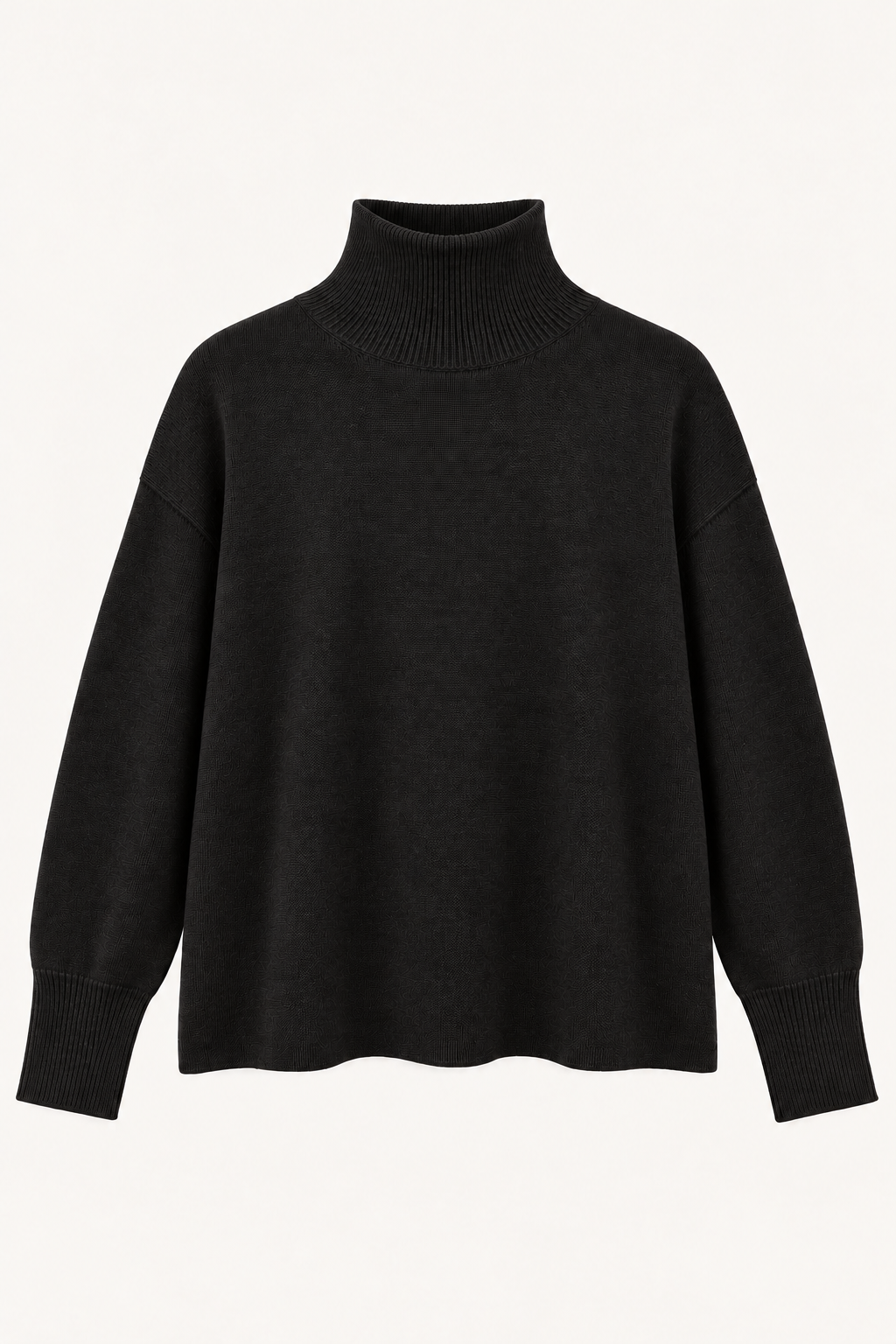 flat lay image of a black boxy cashmere turtle neck knit