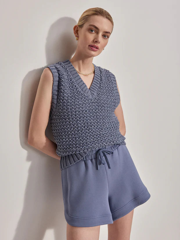 V neck textured  knitted vest in mid blue model shot