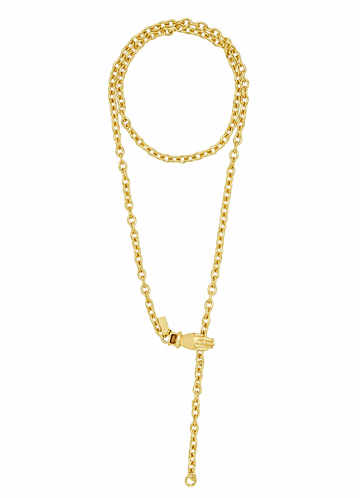 A gold chain necklace with a small hand-shaped charm and an adjustable drop tail, displayed on a clean white background.