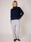 navy combination turtleneck with brown segments and rib detailing model shot