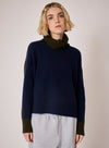 navy combination turtleneck with brown segments and rib detailing