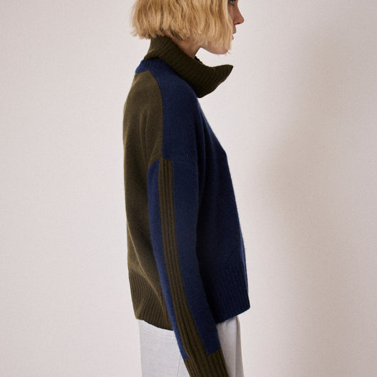 navy combination turtleneck with brown segments and rib detailing side view