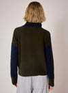 navy combination turtleneck with brown segments and rib detailing rear view