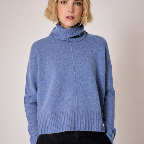 denim blue turtleneck jumper with rib and seam detailing