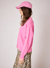pink cardigan with collar and rib detailing side view
