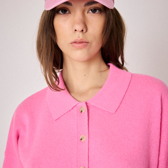 pink cardigan with collar and rib detailing close up