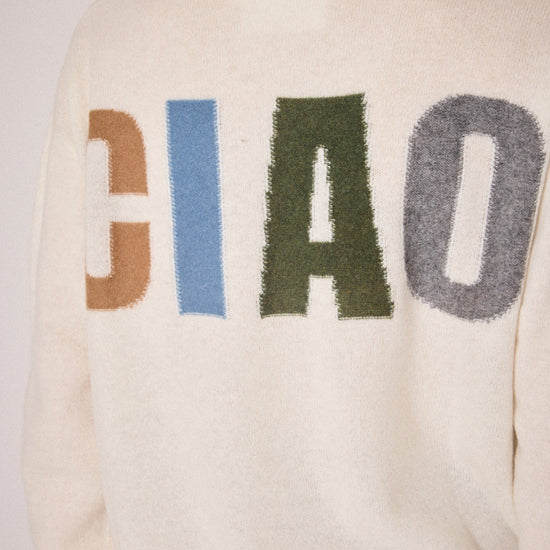 cream round neck jumper with ciao on the rear in colour print close up of rear