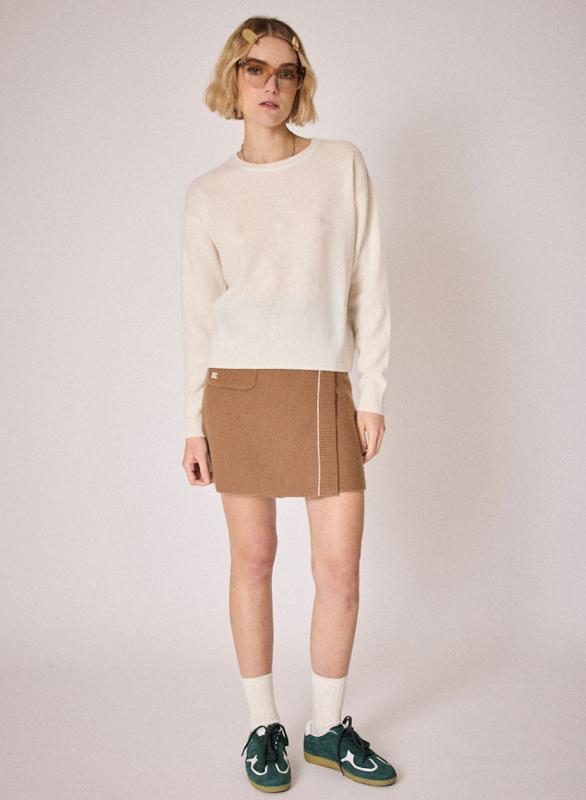 cream round neck jumper with ciao on the rear in colour print model shot