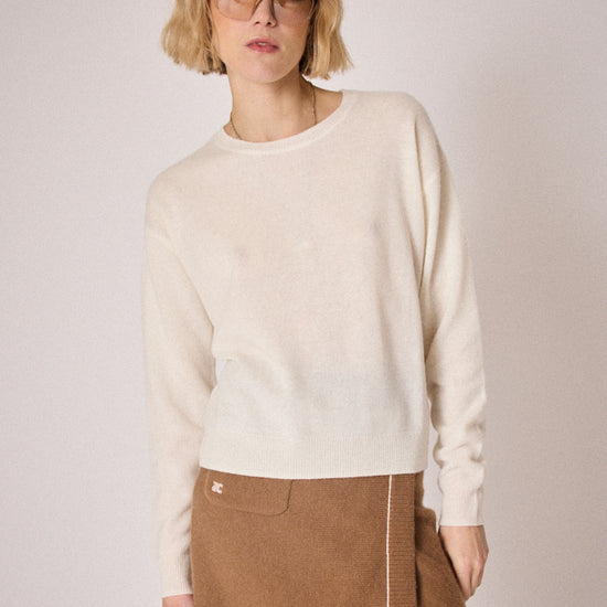 cream round neck jumper with ciao on the rear in colour print