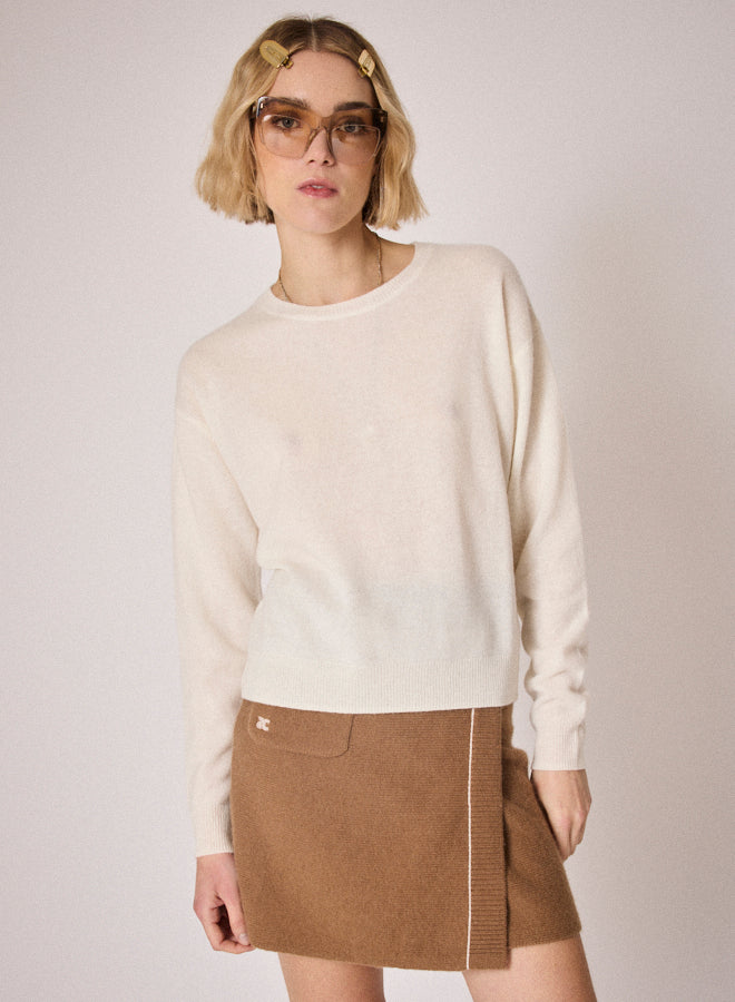 cream round neck jumper with ciao on the rear in colour print