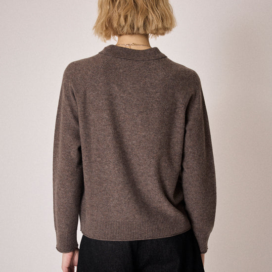 brown knit with collar, half button placket and rib detailing rear view