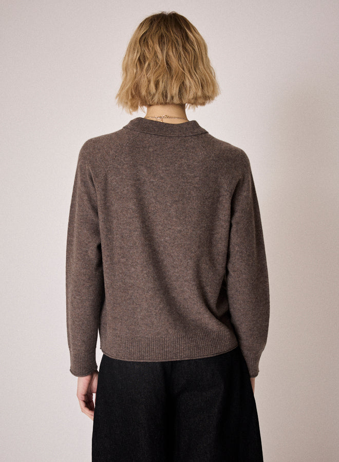 brown knit with collar, half button placket and rib detailing rear view