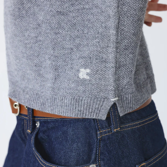 short sleeve grey cashmere knit with collar and rib detailing close up