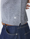 short sleeve grey cashmere knit with collar and rib detailing close up
