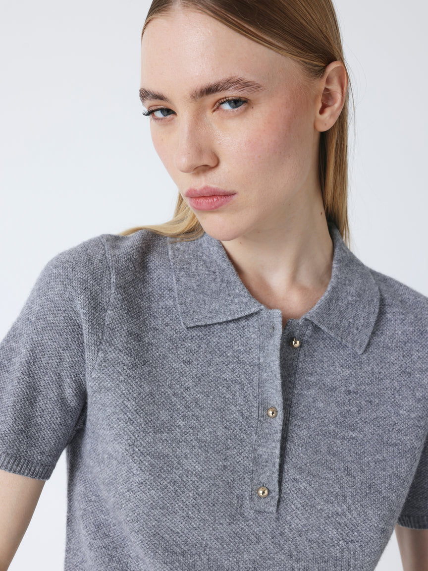 short sleeve grey cashmere knit with collar and rib detailing close up