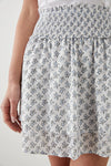 pull on mini skirt with a shirred waistband and tiered skirt