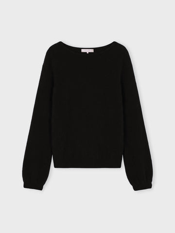 A black long-sleeve knit sweater with a wide boat neckline and ribbed cuffs, displayed flat against a light gray background.