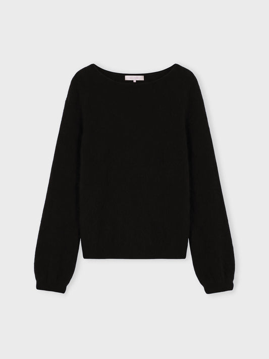 A black long-sleeve knit sweater with a wide boat neckline and ribbed cuffs, displayed flat against a light gray background.