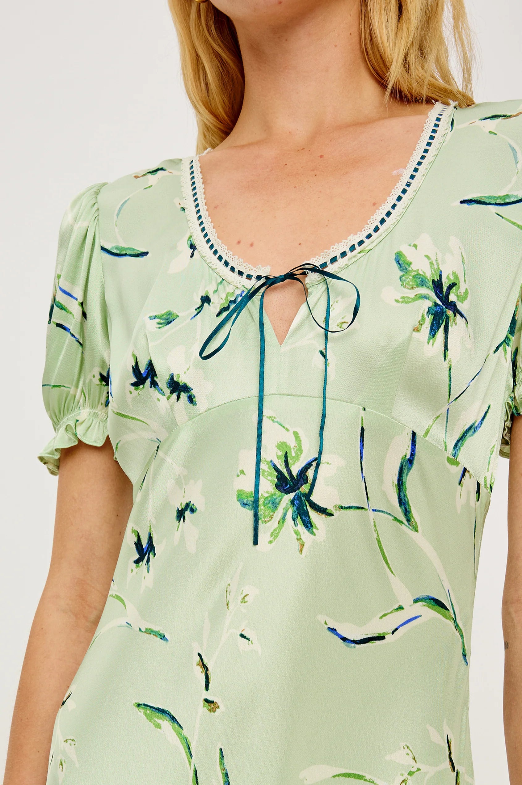 v neck short sleeve mint coloured dress with tie at bust and a flora; print from rails close up