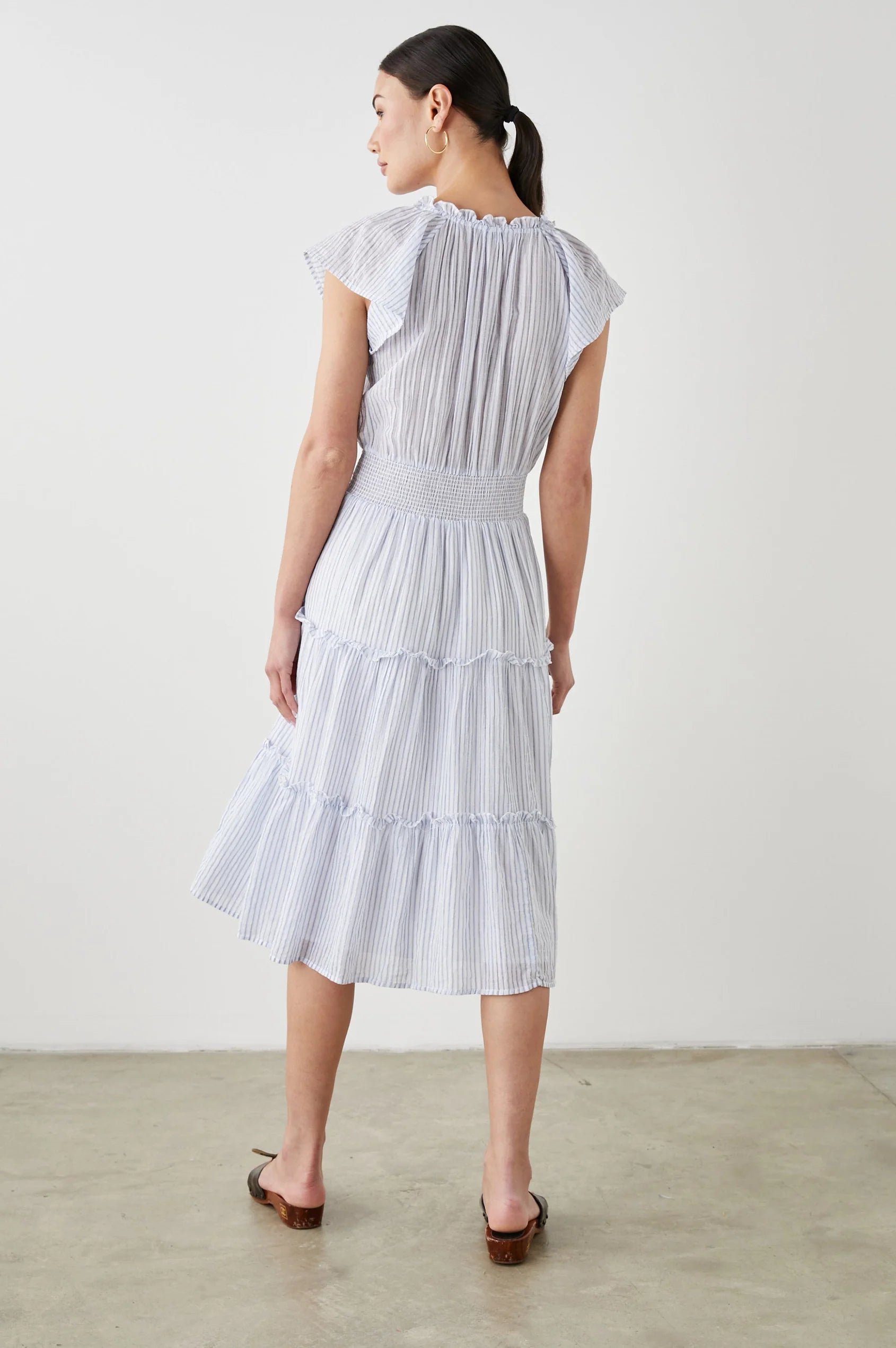Pull on dress with short sleeves and a shirred waistband in a blue and white stripe