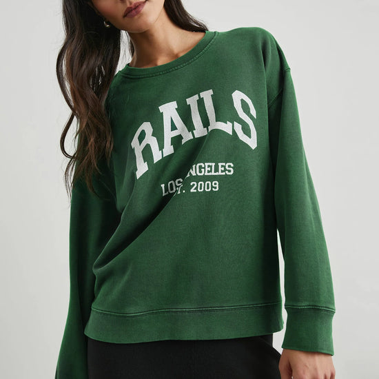 Green sweatshirt with white rails decal on the front