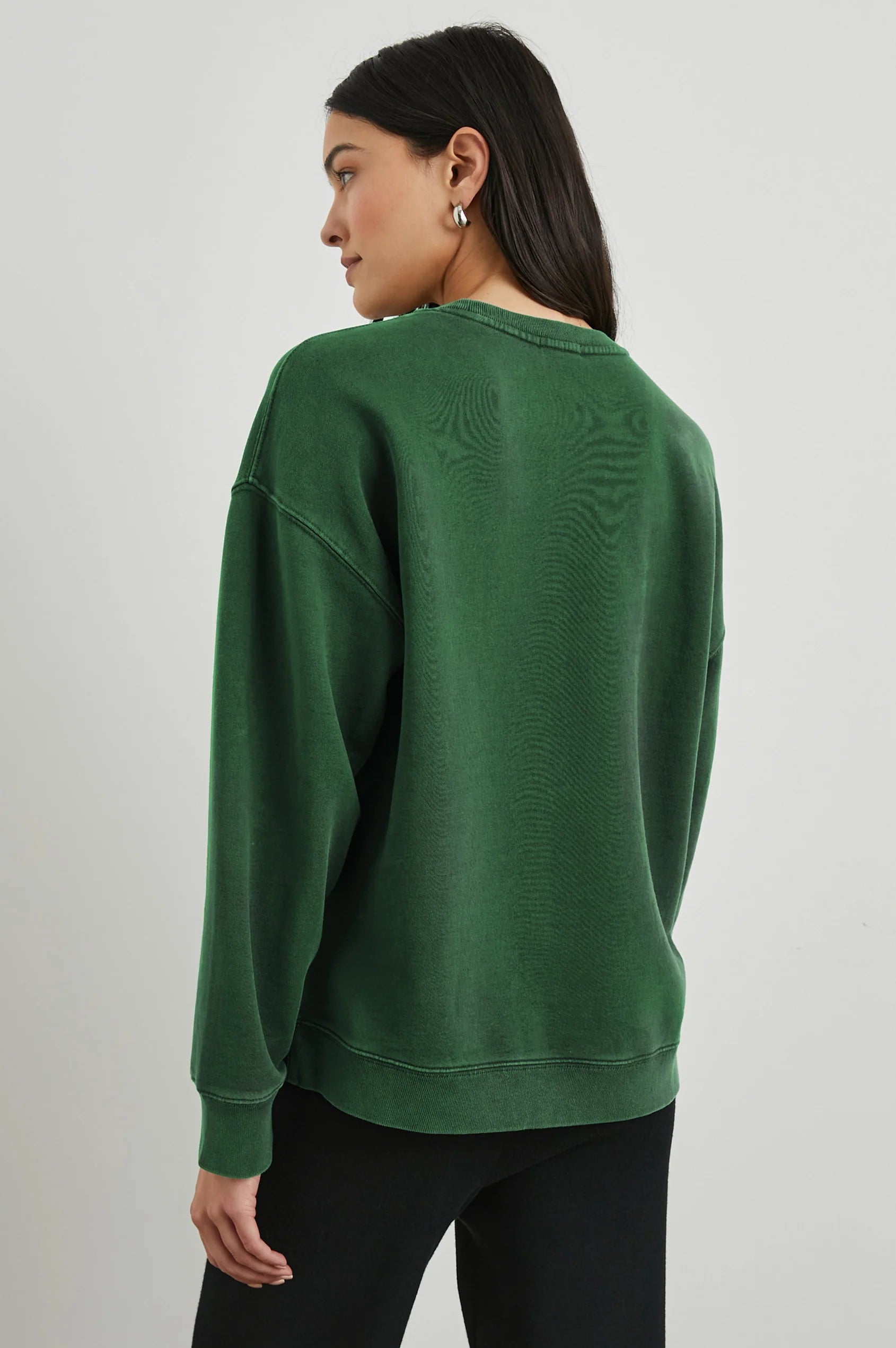 Green sweatshirt with white rails decal on the front rear view