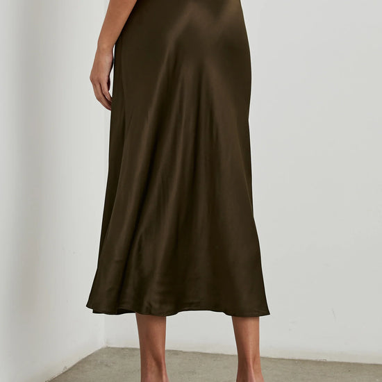 Dark brown bias cut slip skirt with elasticated waist rear view