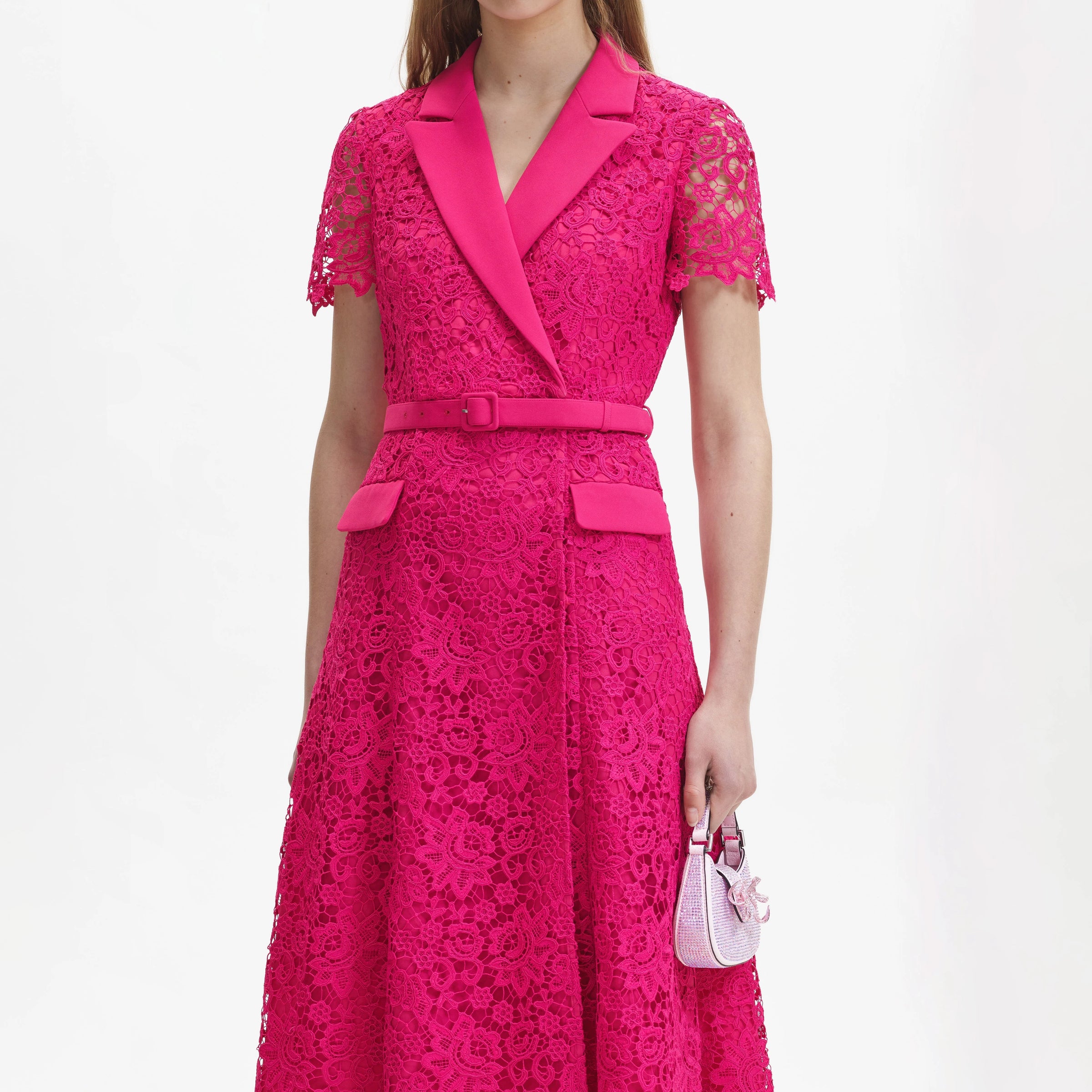 Hot pink lace wrap dress with short sleeves and a waist belt