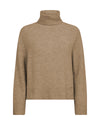 Roll neck jumper in a pale biscuit colour