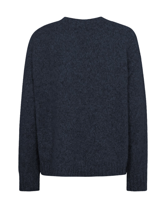 Rear view of chunky navy v neck jumper