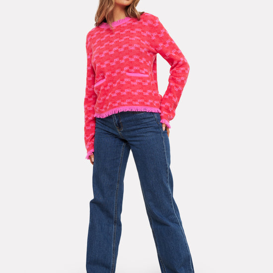 pink check cashmere jumper with 2 front pockets and frayed edge cuffs, neck and hemline