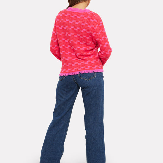 pink check cashmere jumper with 2 front pockets and frayed edge cuffs, neck and hemline rear view 