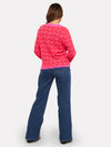 pink check cashmere jumper with 2 front pockets and frayed edge cuffs, neck and hemline rear view 