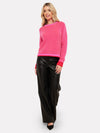 pink and red rib round neck cashmere jumper worn with black trouser